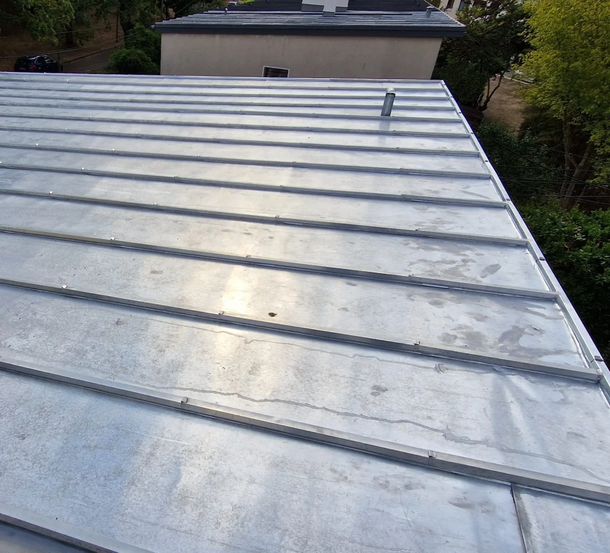 rénovation toiture à herblay-sur-seine avec travaux de zinguerie, gouttières, solins et évacuation des eaux de pluie durable